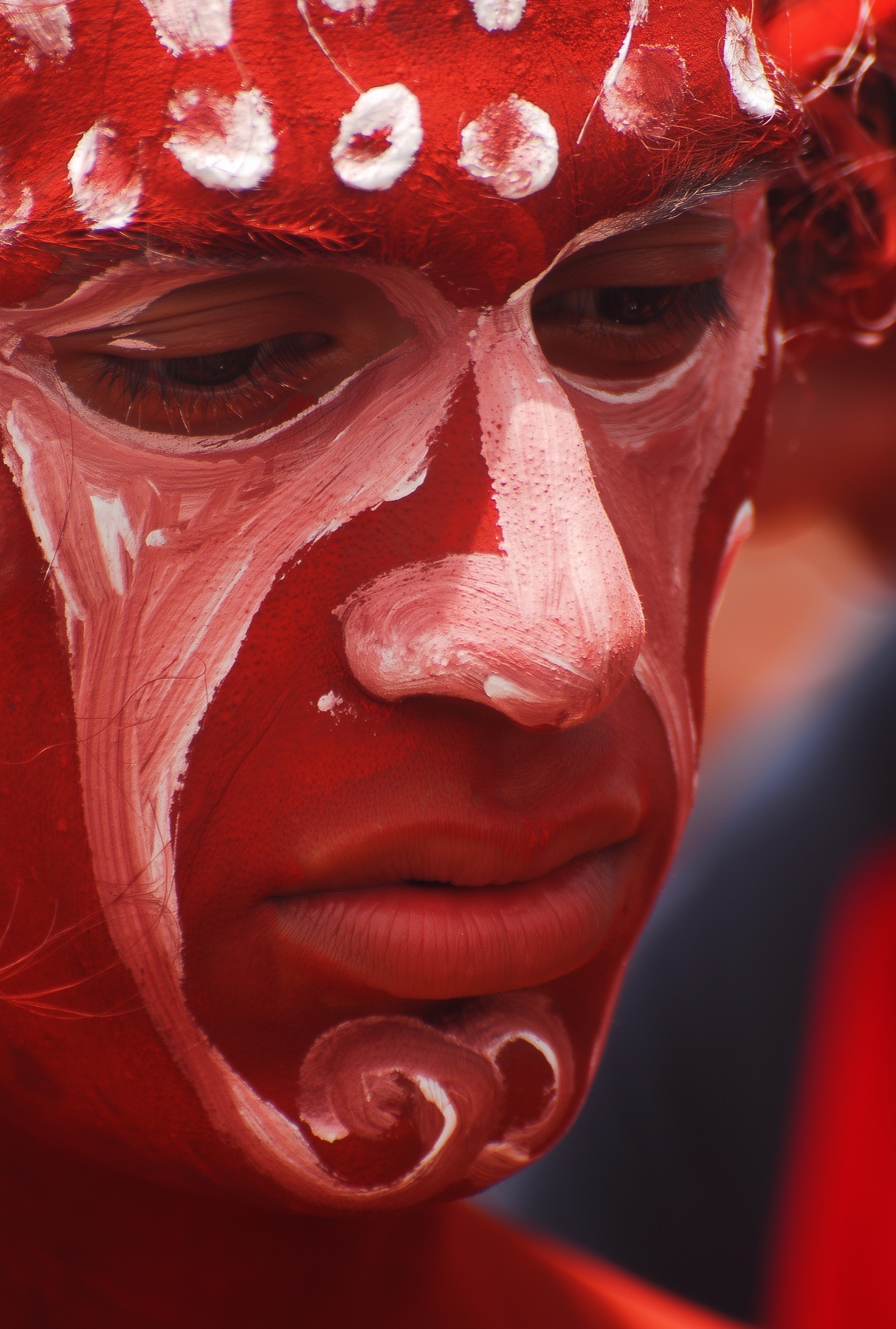 Tero Haoa performing with red body paint at Tapati Rapa Nui.